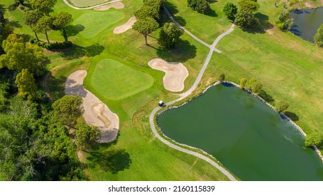 Aerial View Of A Golf Course In The Morning. There Are No People On The Putting Green.