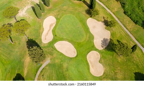 Aerial View Of A Golf Course In The Morning. There Are No People On The Putting Green.