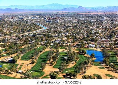 Aerial View Of Golf Course With Scottsdale, Arizona Skyline