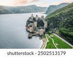 Aerial view of Golubac Fortress in Serbia, perched along the Danube River with its ancient stone towers and medieval architecture.