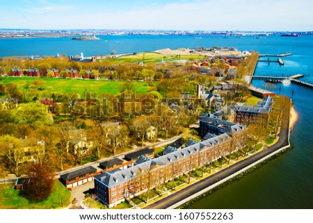 Aerial view of Governors Island in Upper New York Bay, Manhattan area, New York City, America. USA. American architecture building. Panorama of Metropolis NYC. Mixed media.