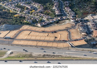 Aerial of view of graded dirt lots ready for new tract home construction in Los Angeles County California. - Shutterstock ID 2252767535