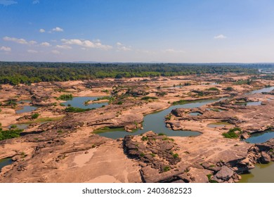 Aerial view of Grand Canyon in Thailand, Natural of rock canyon in Mekhong River, Hat Chom Dao or Chomdao Beach and Kaeng Hin Ngam in Ubon Ratchathani province, Thailand. - Powered by Shutterstock