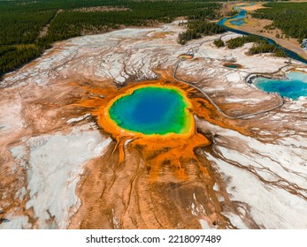 Aerial view of Grand Prismatic Spring in Midway Geyser Basin, Yellowstone National Park, Wyoming, USA. It is the largest hot spring in the United States - Powered by Shutterstock