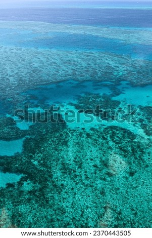 Aerial view of Great Barrier Reef in Cairns, Queensland Australia.