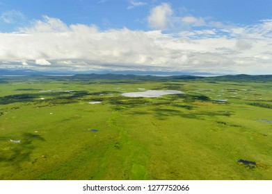 Aerial view of the green forest in the 
North of  Khabarovsk territory, far East, Russia.