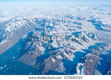 An aerial view of Green land with ice sheets. 