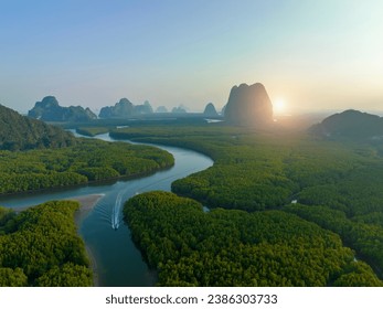 Aerial view green mangrove forest and river flowing at Phang Nga Bay with mountains in Thailand. - Powered by Shutterstock