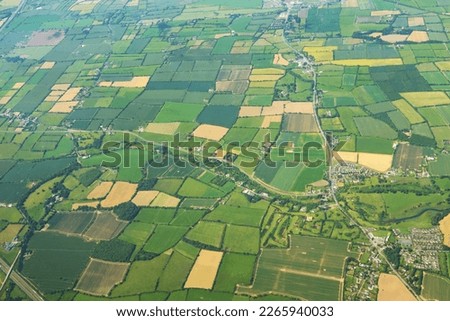 Aerial view of green pattern fields above germany