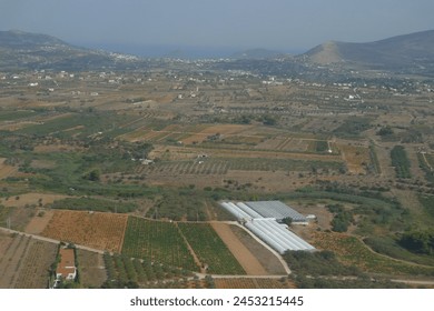 Aerial view of greenhouses and agricultural land in Mesogeia region, Attica, Greece - Powered by Shutterstock