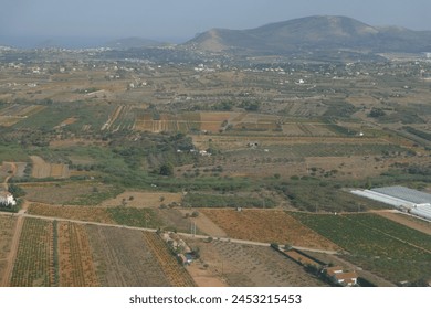 Aerial view of greenhouses and agricultural land in Mesogeia region, Attica, Greece - Powered by Shutterstock