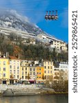 Aerial view of Grenoble with French Alps and cable car, France