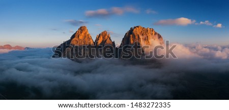 Aerial view of Grohmann spitze above clouds, Dolomites, Italy