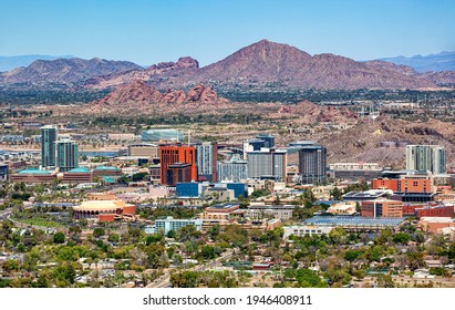Aerial view of the growing Tempe, Arizona downtown skyline with Camelback Mountain in the distance