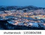 Aerial view of Harstad city the small harbour of Norwegian at twilight in winter season, Norway, Europe