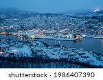 Aerial view of Harstad city the small harbour of Norwegian at twilight in winter season, Norway, Europe