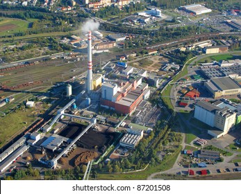 Aerial View Of Heating Plant And Thermal Power Station. Combined Modern Power Station For City District Heating And Generating Electrical Power. Industrial Zone From Above.