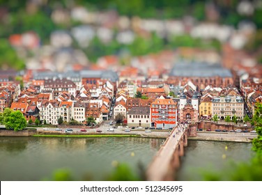 Aerial view of Heidelberg old town and Neckar river, Baden-Wurttemberg state, Germany. Tilt-shift Miniature Effect - Powered by Shutterstock