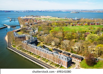 Aerial view from helicopter on Governors Island in Upper New York Bay. New York City, NYC, USA. Liberty Island is on the background