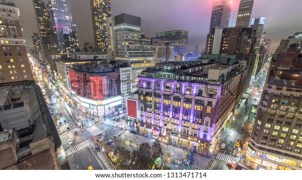 Aerial view of\
Herald Square at night, New\
York.