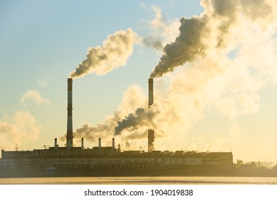 Aerial View Of High Chimney Pipes With Grey Smoke From Power Plant. Production Of Electricity With Fossil Fuel. Factory Polluting Air. Global Warming Concept