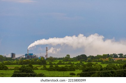 Aerial View Of High Smoke Stack With Smoke Emission. Plant Pipes Pollute Atmosphere. Industrial Factory Pollution, Smokestack Exhaust Gases.