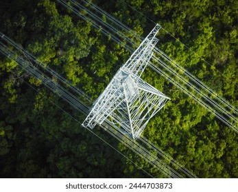 Aerial view of high voltage electricity tower on mountain - Powered by Shutterstock