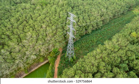 Aerial view of High voltage post or High voltage tower in forest