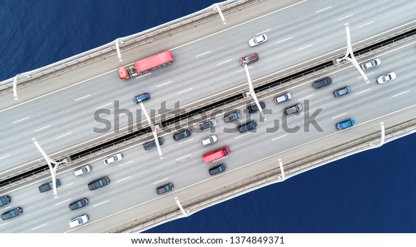 Aerial\
view of a high way road on the bridge. top\
view