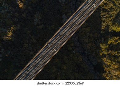 aerial view of a high-speed railroad track on a bridge - Powered by Shutterstock