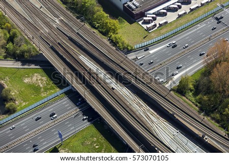 Aerial view of highway A10 in Amsterdam, Holland. A railroadtrack overpasses the freeway.