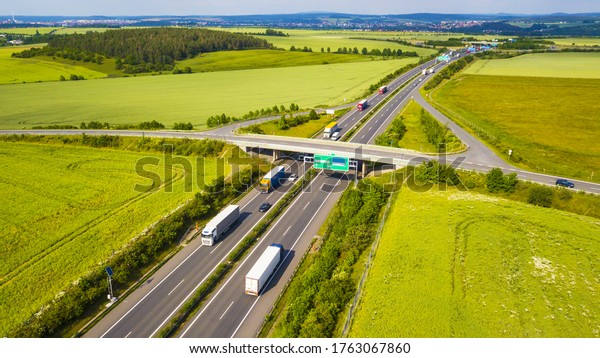 Aerial view of a highway with bridge.\
Transportation on D5 highway, which leads from Prague to Bavaria.\
Czech republic, European\
union.