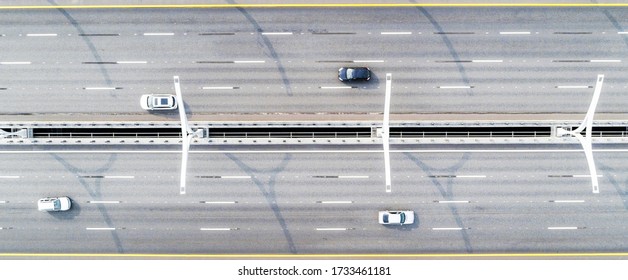 Aerial View Of Highway. Cars Crossing Bridge Interchange Overpass. Highway Interchange With Traffic. Aerial Bird's Eye Highway. Expressway. Road Junction. Car Passing. Bridge With Traffic