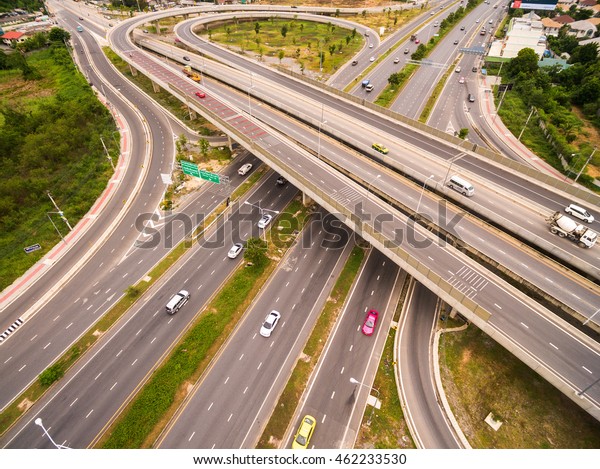 Aerial view of highway interchange of a city,\
Top view over the road and highway\
