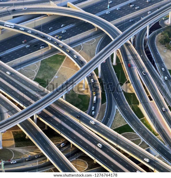 Aerial view of highway interchange Cityscapes traffic\
bridge, logistics - Roads and lanes Crossroads, Dubai, United Arab\
Emirates 