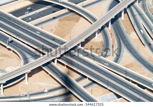 Aerial\
view of highway interchange of modern urban\
city.