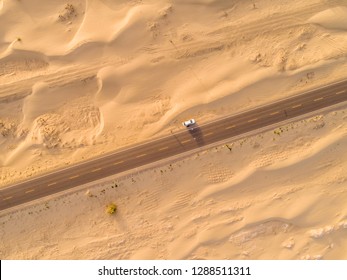 aerial view of highway on the gobi desert xinjiang  - Powered by Shutterstock