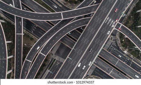 Aerial View Of Highway And Overpass In City On A Cloudy Day