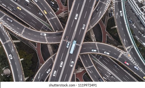 Aerial view of highway and overpass in east Yan`an road, Shanghai city on a cloudy day - Shutterstock ID 1119972491