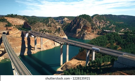Aerial view of highway and railway bridges in Spain - Shutterstock ID 1228135921