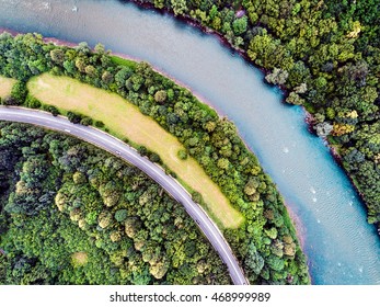 Aerial View Of Highway, River, Forest And Grassland