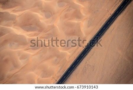 Aerial view of highway road in the desert