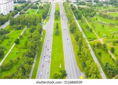 Aerial view of the highway. Straight two-way road through the park