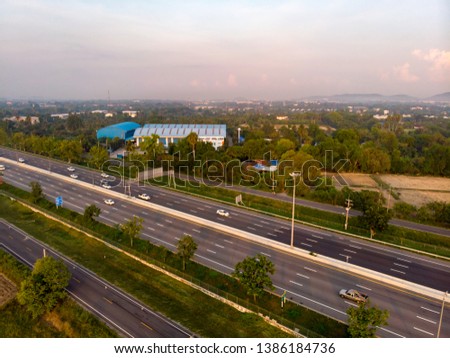 Aerial view Highway that connects the city With good morning Summer of Thailand