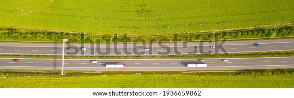 Aerial view of a highway with traffic.\
Transportation on D5 highway, which leads from Prague to Bavaria.\
Czech republic, European\
union.