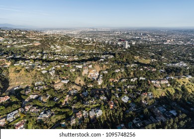 Aerial View Of Hillside And Canyon Homes Above Beverly Hills And West Hollywood In Los Angeles California.  