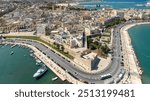 Aerial view of the historic center and the waterfront of Bari, Puglia, Italy. In the historic center, called Old Bari, there are Basilica of Saint Sabinus, Basilica of Saint Nicholas and a castle.