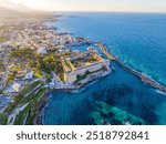 Aerial view of Historic Kyrenia Castle, marina harbour and port with yachts. Tarihi Girne Kalesi, Girne Kordonboyu. Northern Cyprus