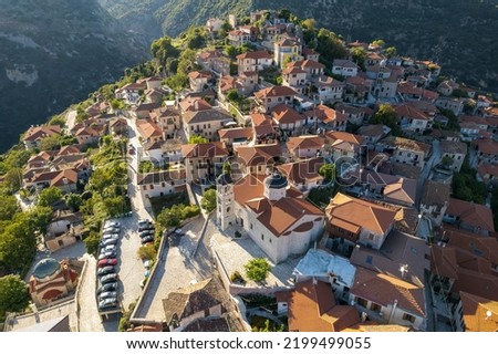 Aerial view of the historical village Dimitsana with the traditional houses and the famous clock tower in Arcadia, Peloponnese, Greece