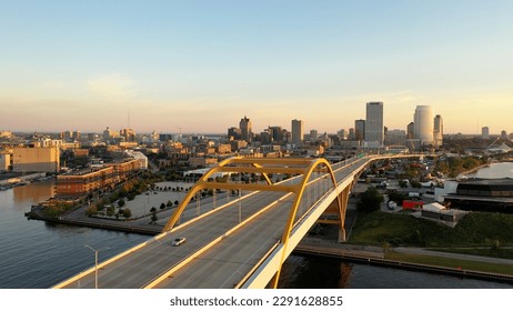 Aerial view of Hoan Memorial Bridge, highway in Milwaukee, Wisconsin, USA. Highway, traffic in morning at sunrise, Downtown in the background. Cityscape, Skyline - Powered by Shutterstock